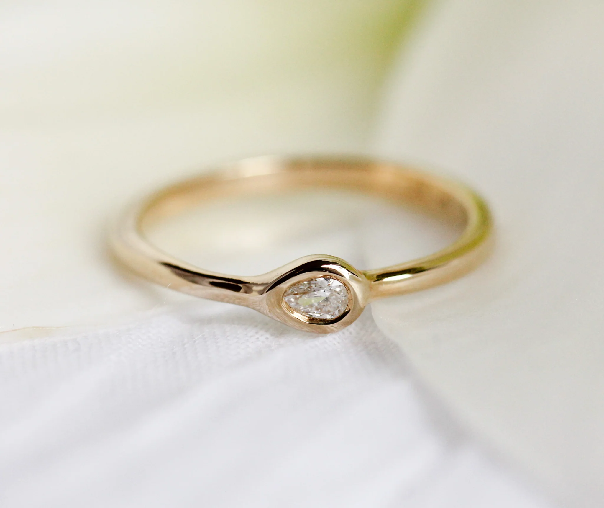 The Lyric Pear: A 14k Gold Hand-Carved Diamond Ring - Mitchell's Manufacturing Jewel