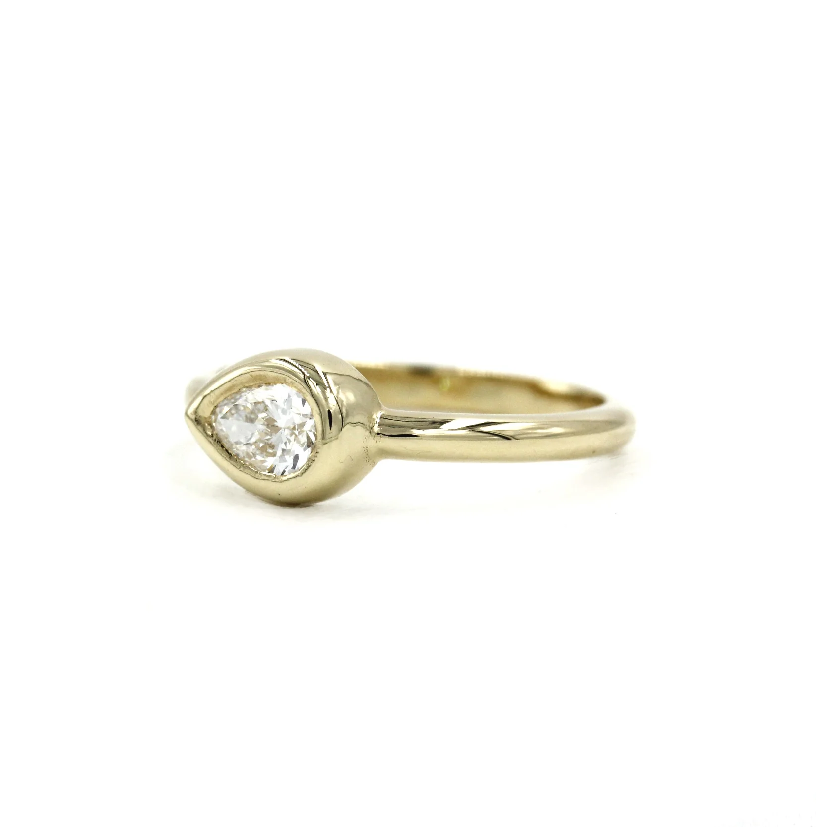 The Lyric Pear Grande: A 14k Gold Hand-Carved Diamond Ring - Mitchell's Manufacturing Jewel